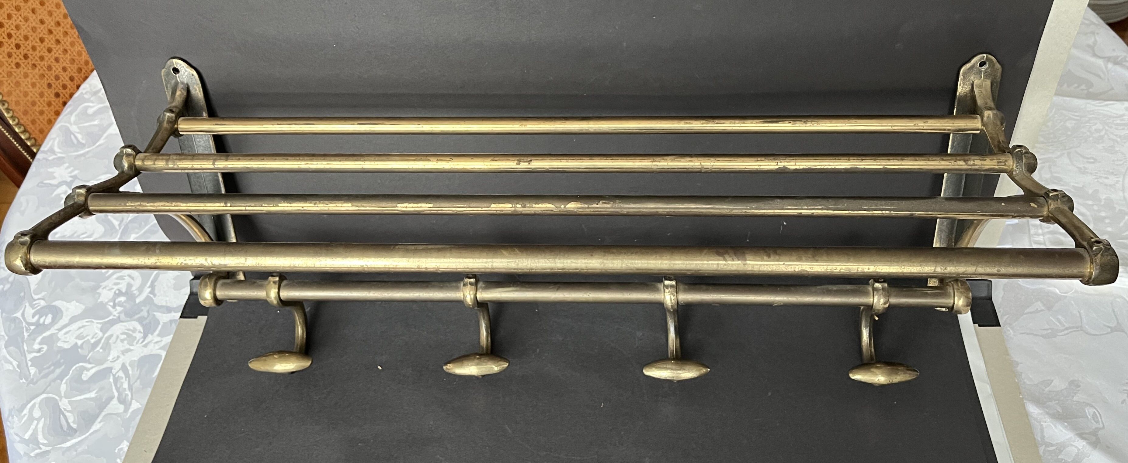 Antique coat rack in gilded metal