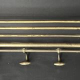 Antique coat rack in gilded metal
