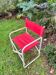 Chaise pliante rouge vintage