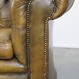 2.5 seater leather chesterfield sofa in a moss green color