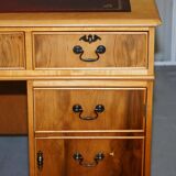 Vintage satin wood partner desk with leather top.
