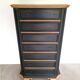 Seven-drawer chest of solid wood