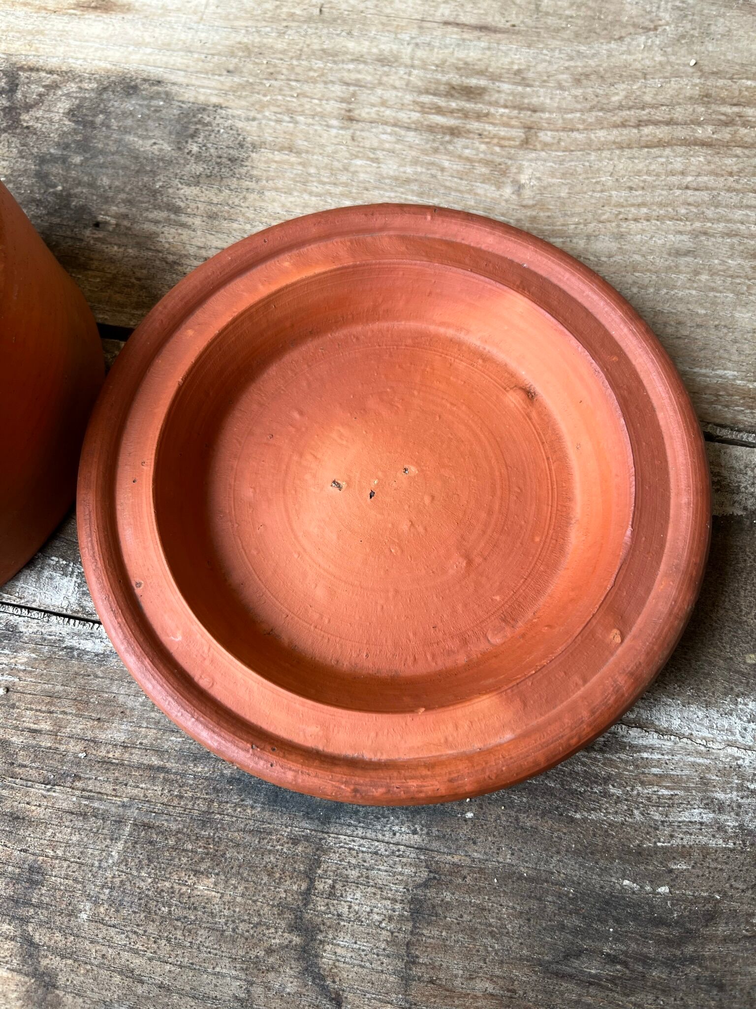 Cheese or butter bell in terracotta and its dish