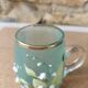Enamelled glass mug/cup