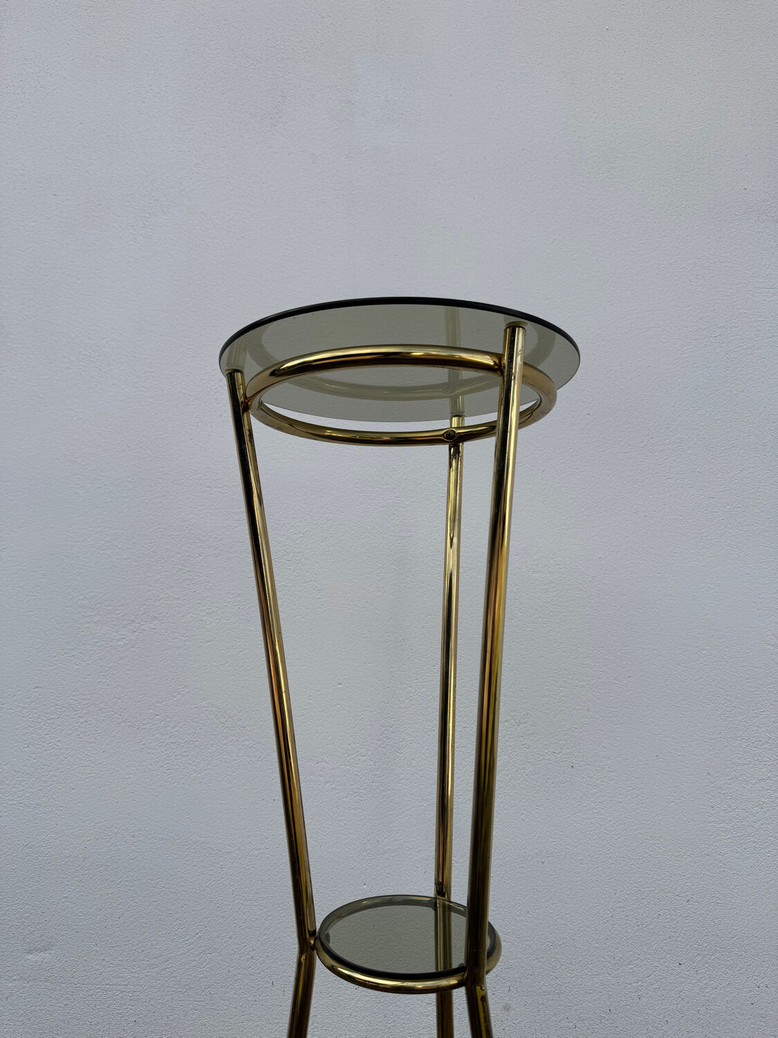 Golden tripod stand with smoked glass from the 1970s.