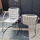 A pair of space age wire chairs