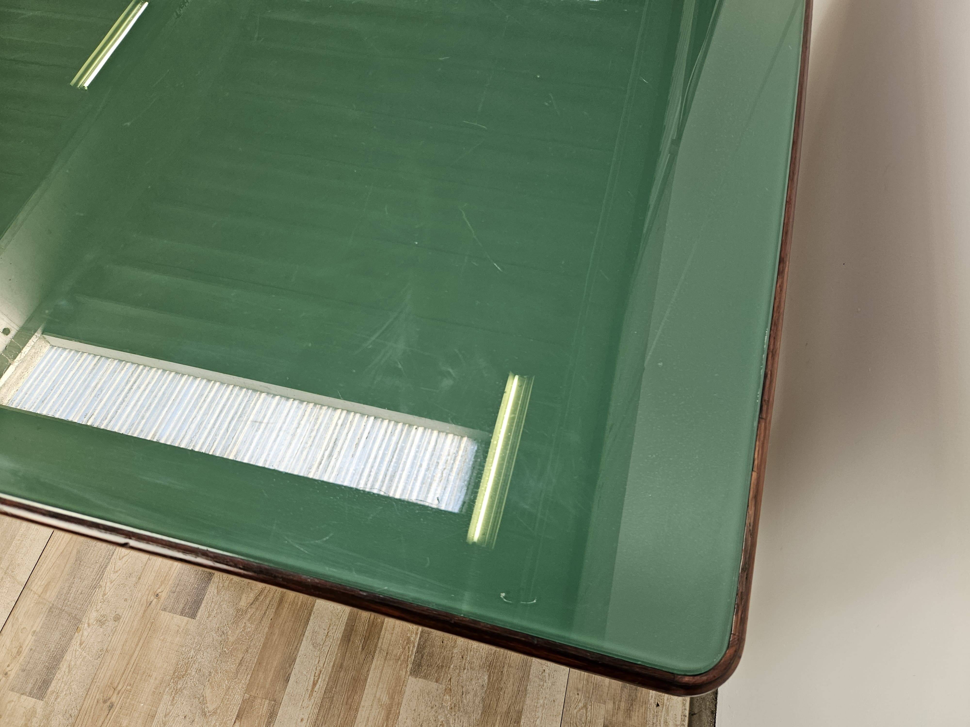 Executive Art Decò desk in exotic wood, glass, and brass