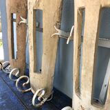 Lot of three terracotta and wrought iron appliques