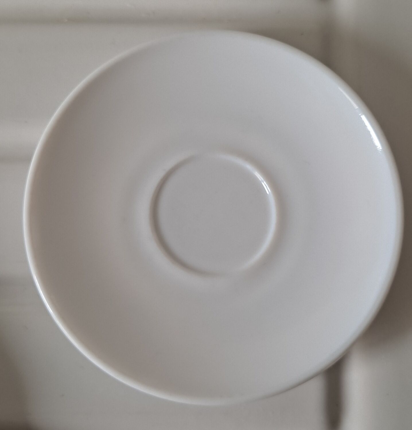 Trio of mismatched white cups