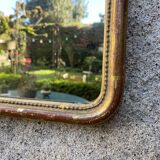 Louis-Philippe mirror gilded with gold leaf