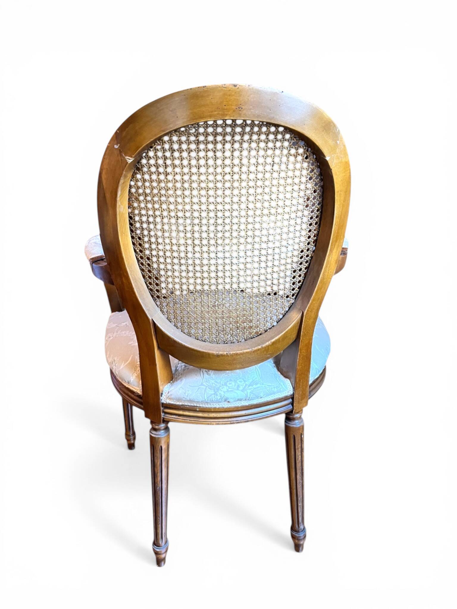 Louis XVI style medallion armchair with caning, 20th century.