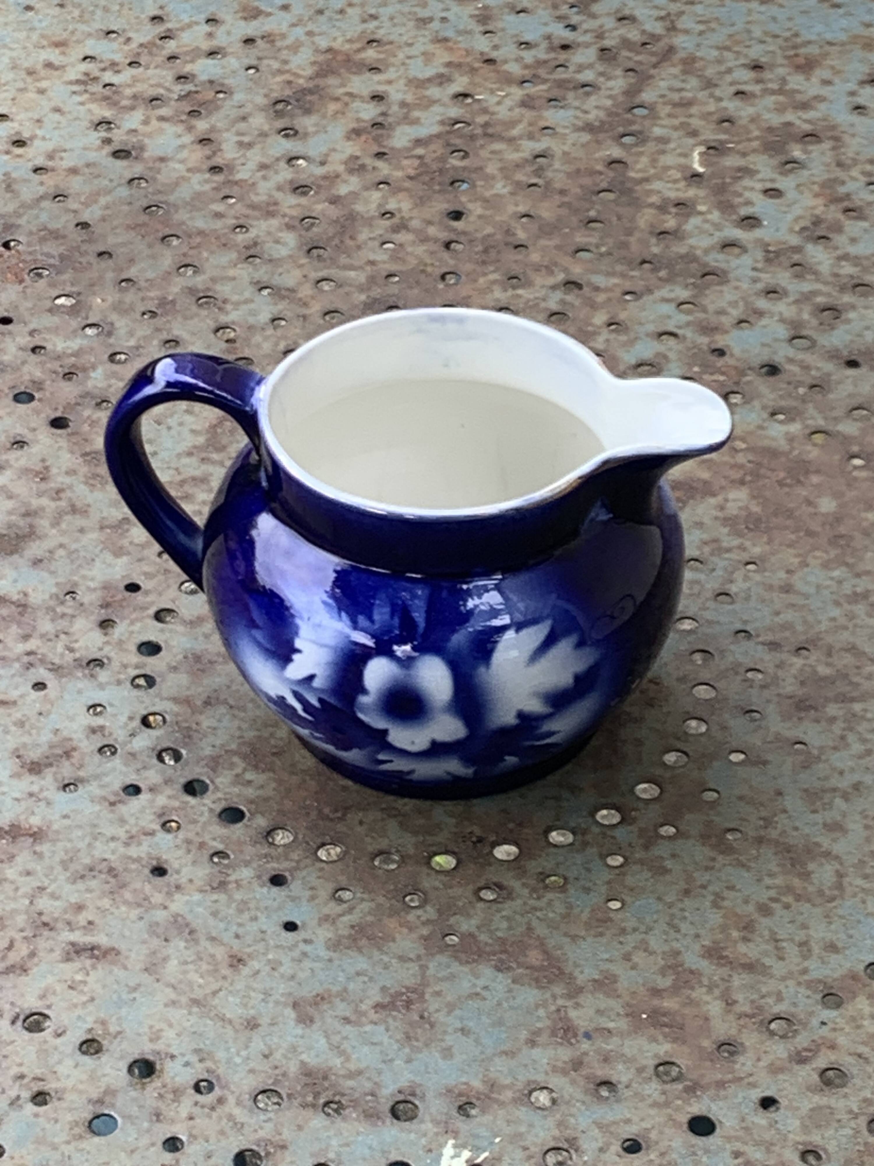 Milk jug with blue and gold peony pattern, made in England,