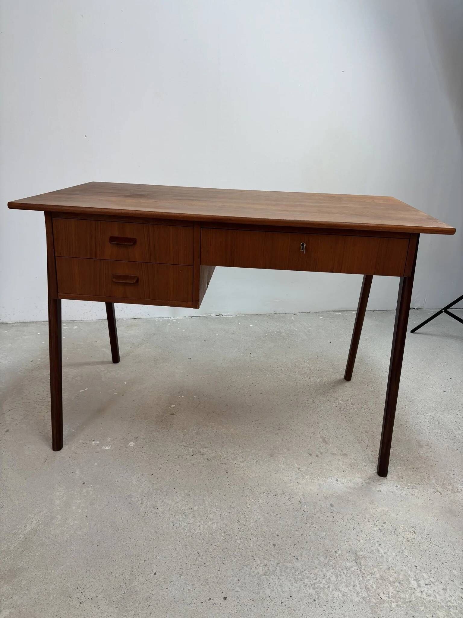 Flat desk in teak with three drawers, Scandinavian work from the 1950s-70s.