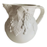 White slip pitcher