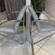Pair of Souvignet armchairs, grey leather, chrome, 1980.