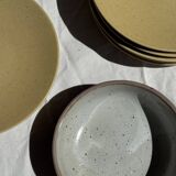 A speckled grey interior bowl with a matte brown exterior H5 D15