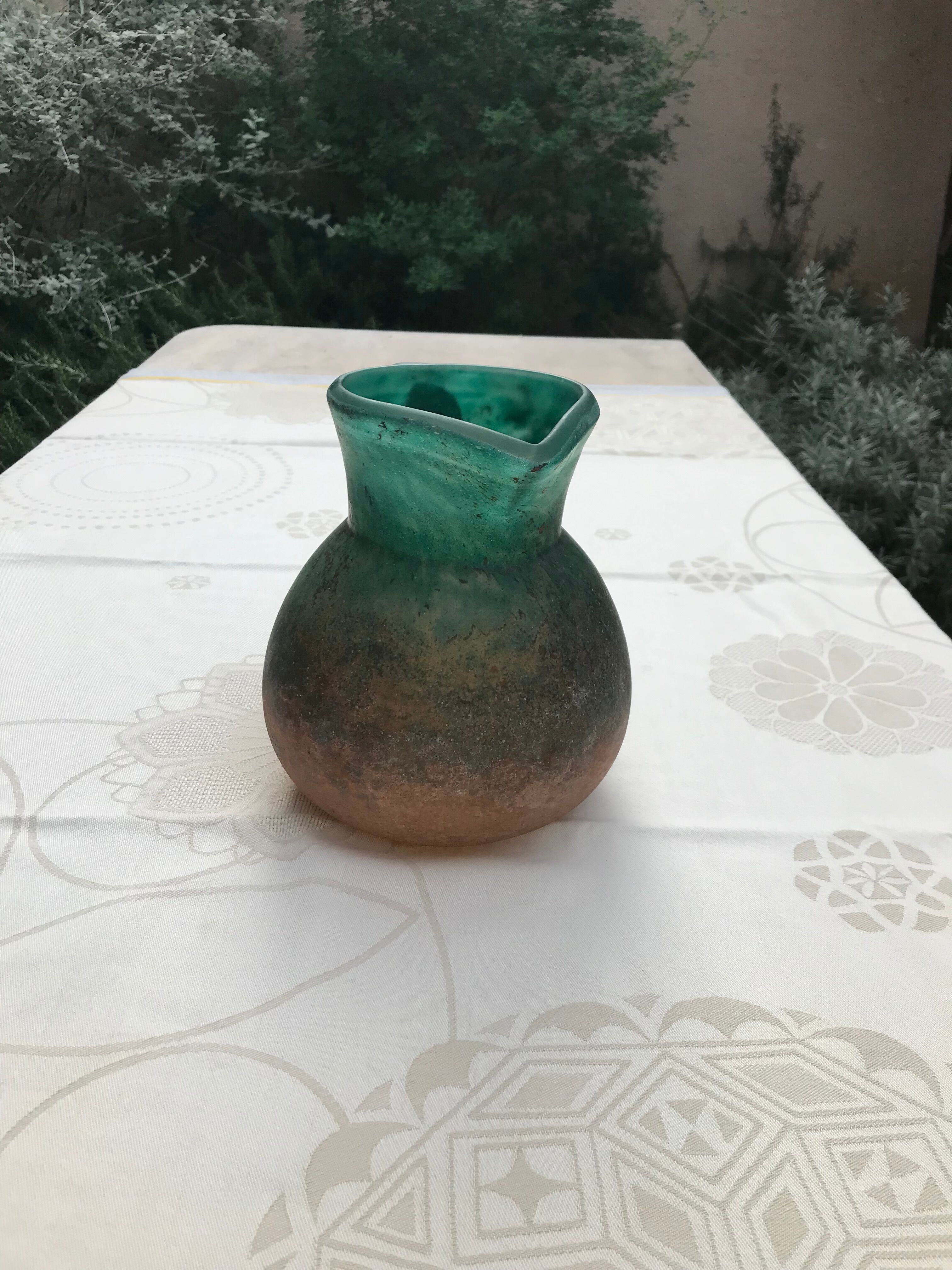 Orange and green glass paste pitcher by Georges DE FEURE