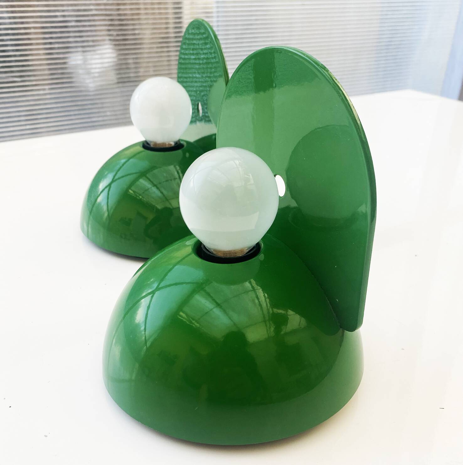 Pair of Buco wall lights designed by Claudio Dini for Artemide in 1974