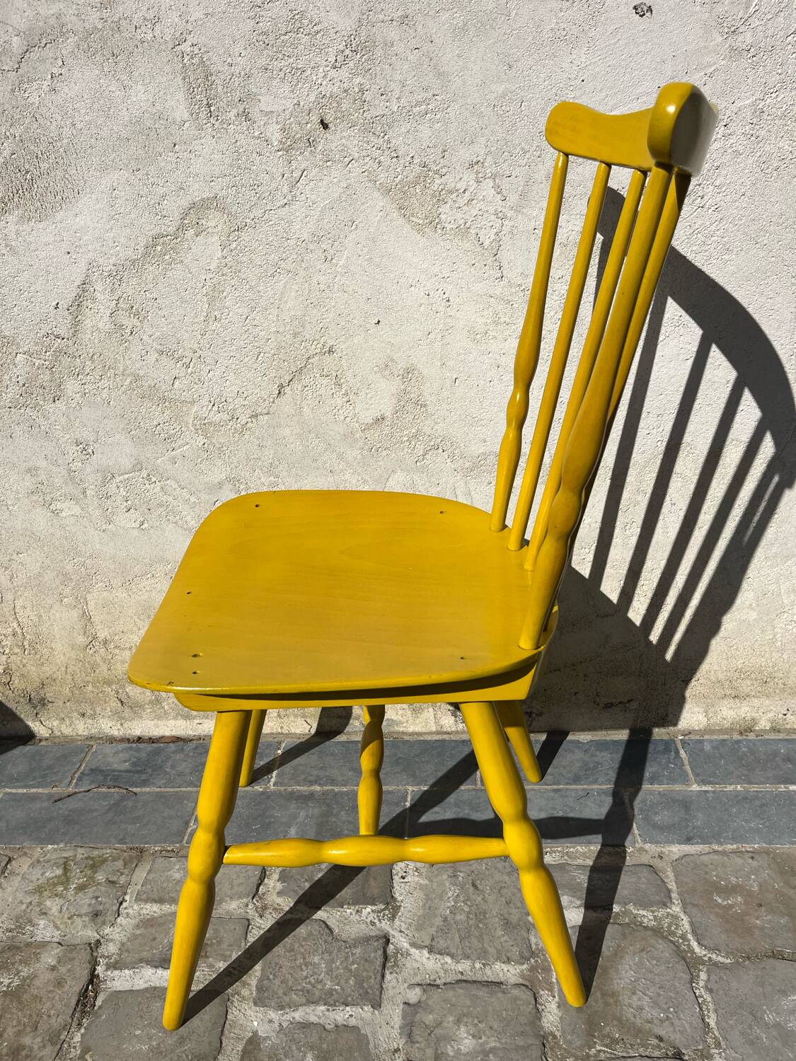 Mustard yellow Baumann chair