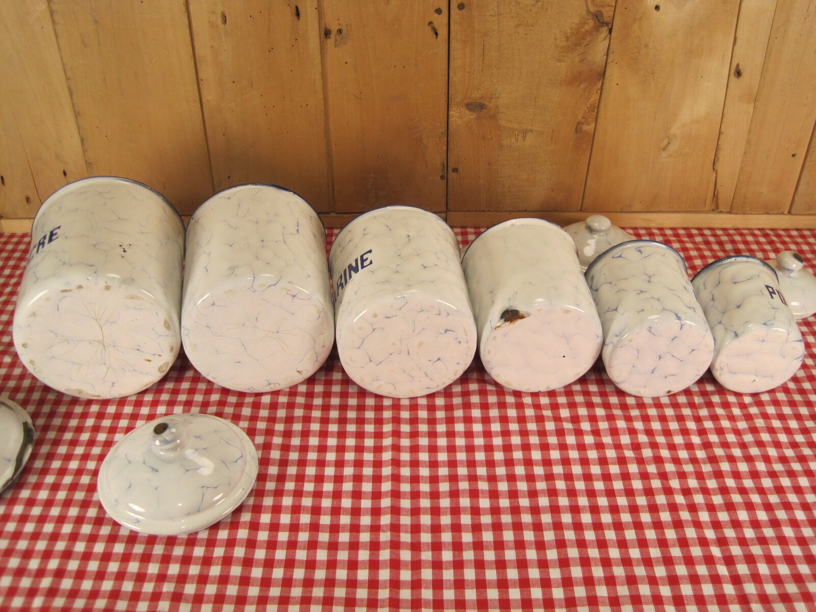 6 old spice pots in white and blue enamelled sheet metal