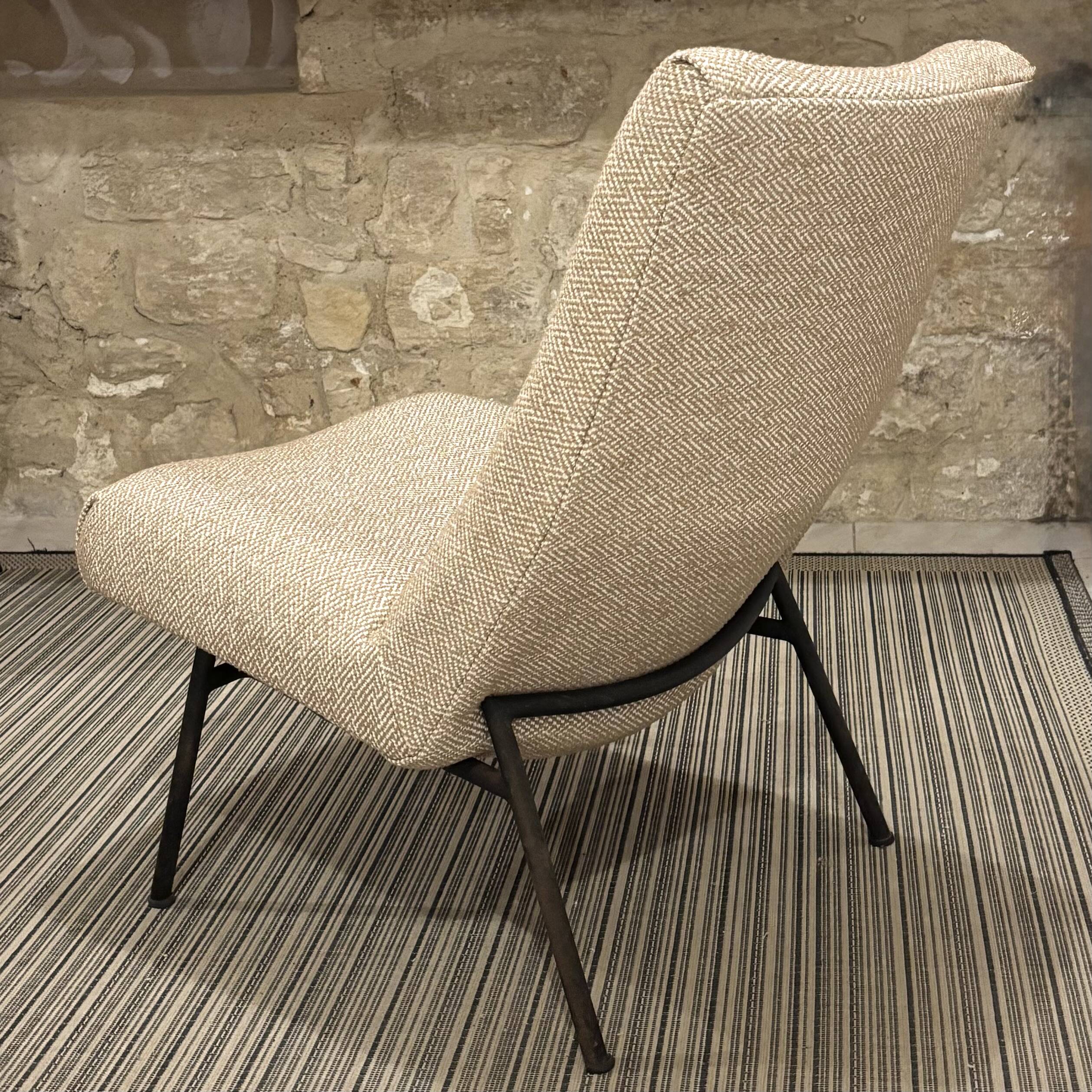 Pair of armchairs by Pierre Guariche for Steiner reupholstered.