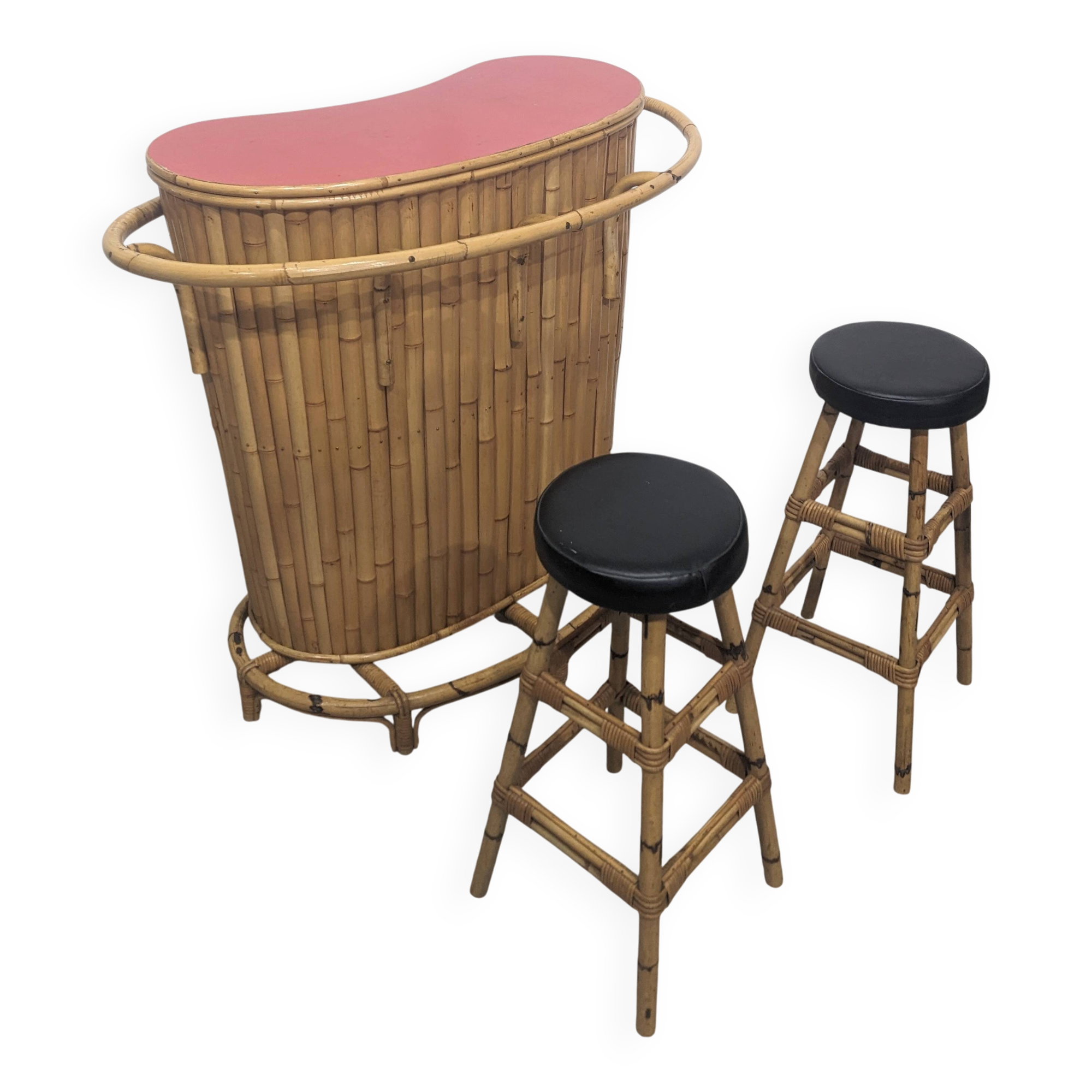 Vintage sixties tiki bar with stools.
