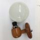 Modernist wall lamp in pine and opaline