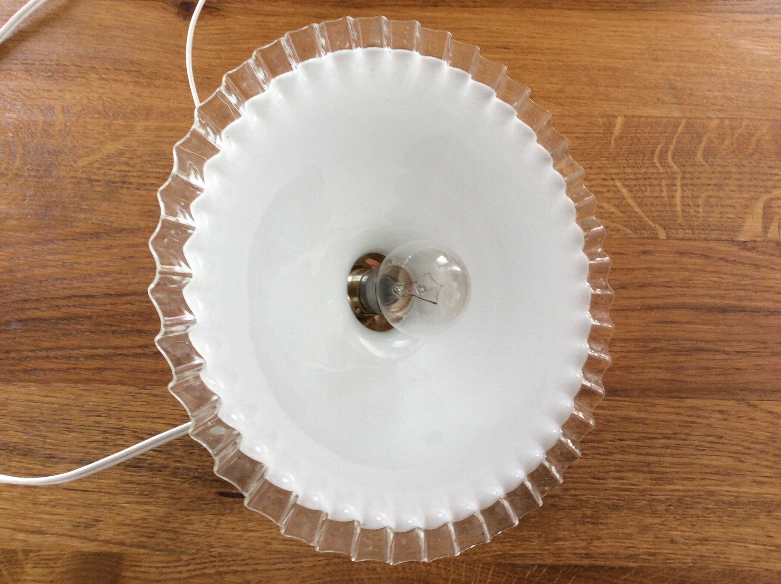 Old hanging lamp in dented opaline