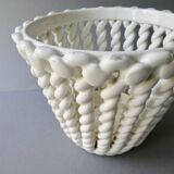Openwork and braided ceramic pot cover