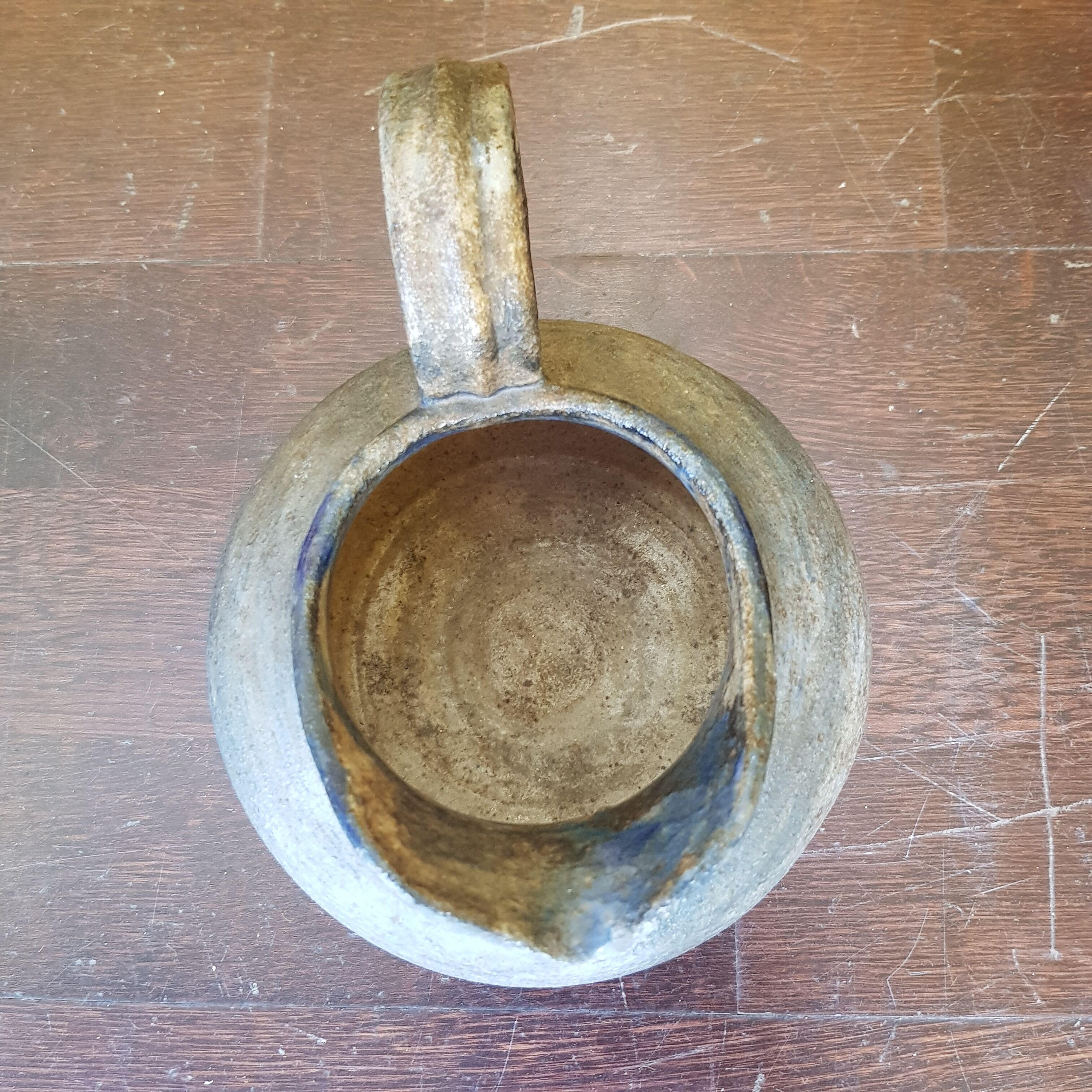 Pitcher in ancient sandstone