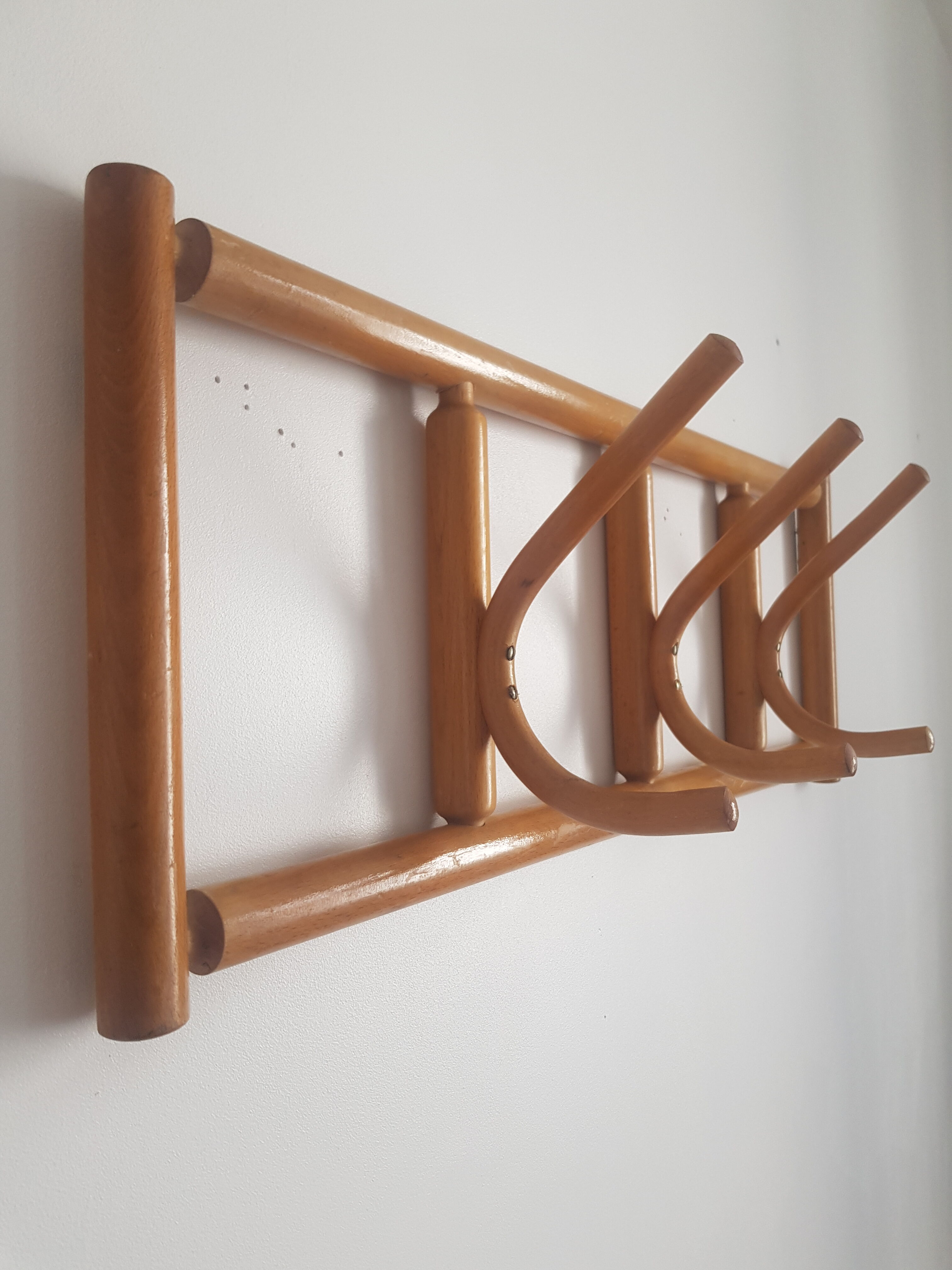 Wooden wall coat rack