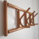 Wooden wall coat rack