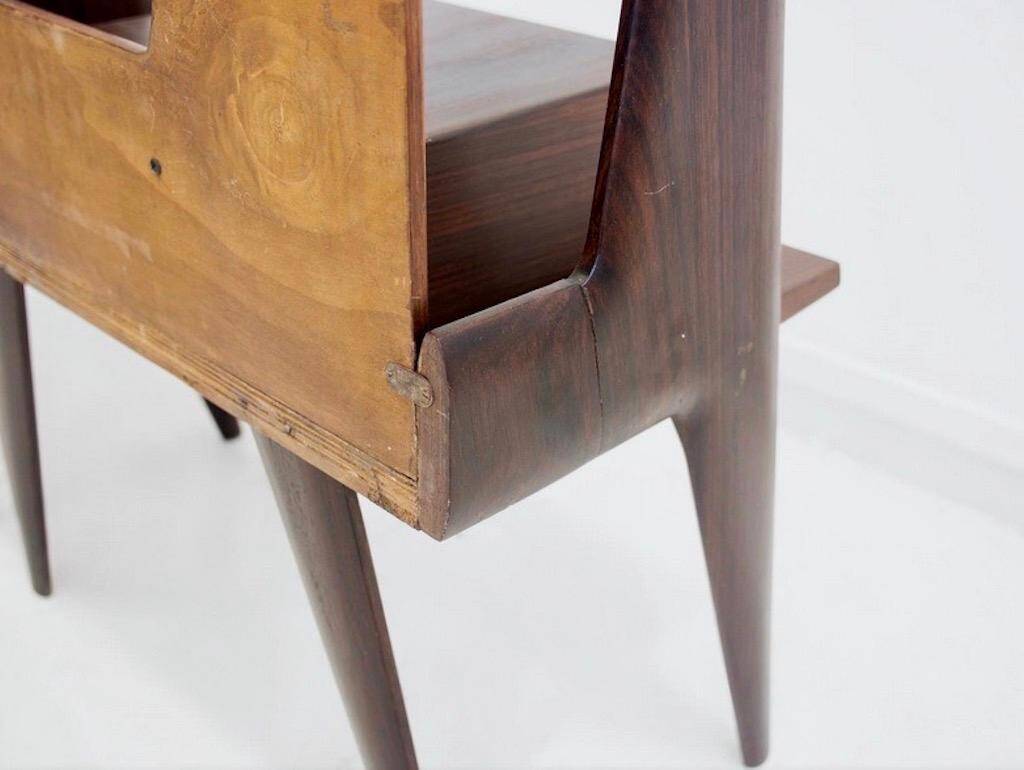 Pair of modernist Italian bedside tables in wood with a glass top.