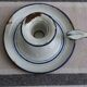 Old enamel candle holder