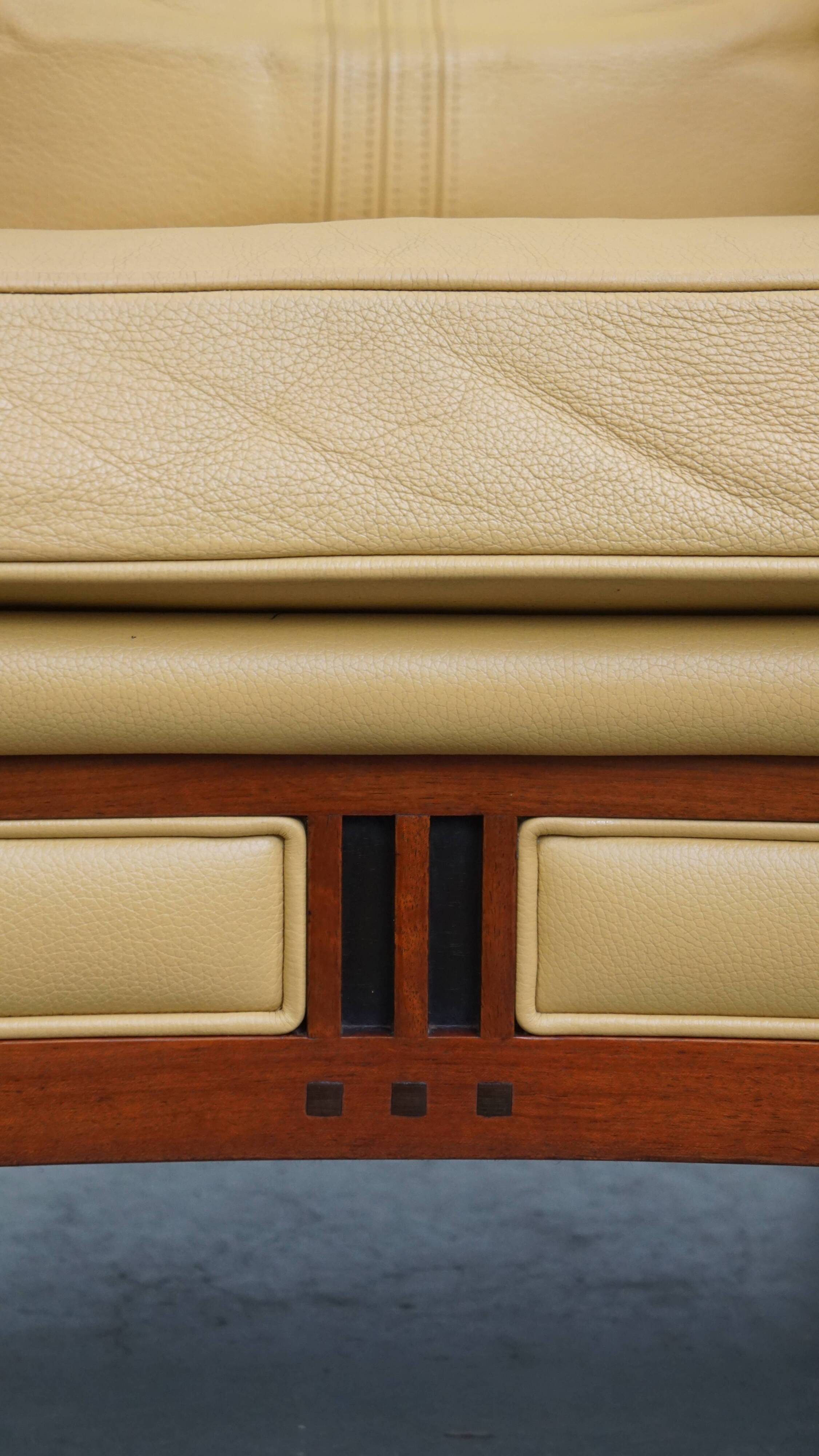 Art Deco armchair in yellow leather with high back