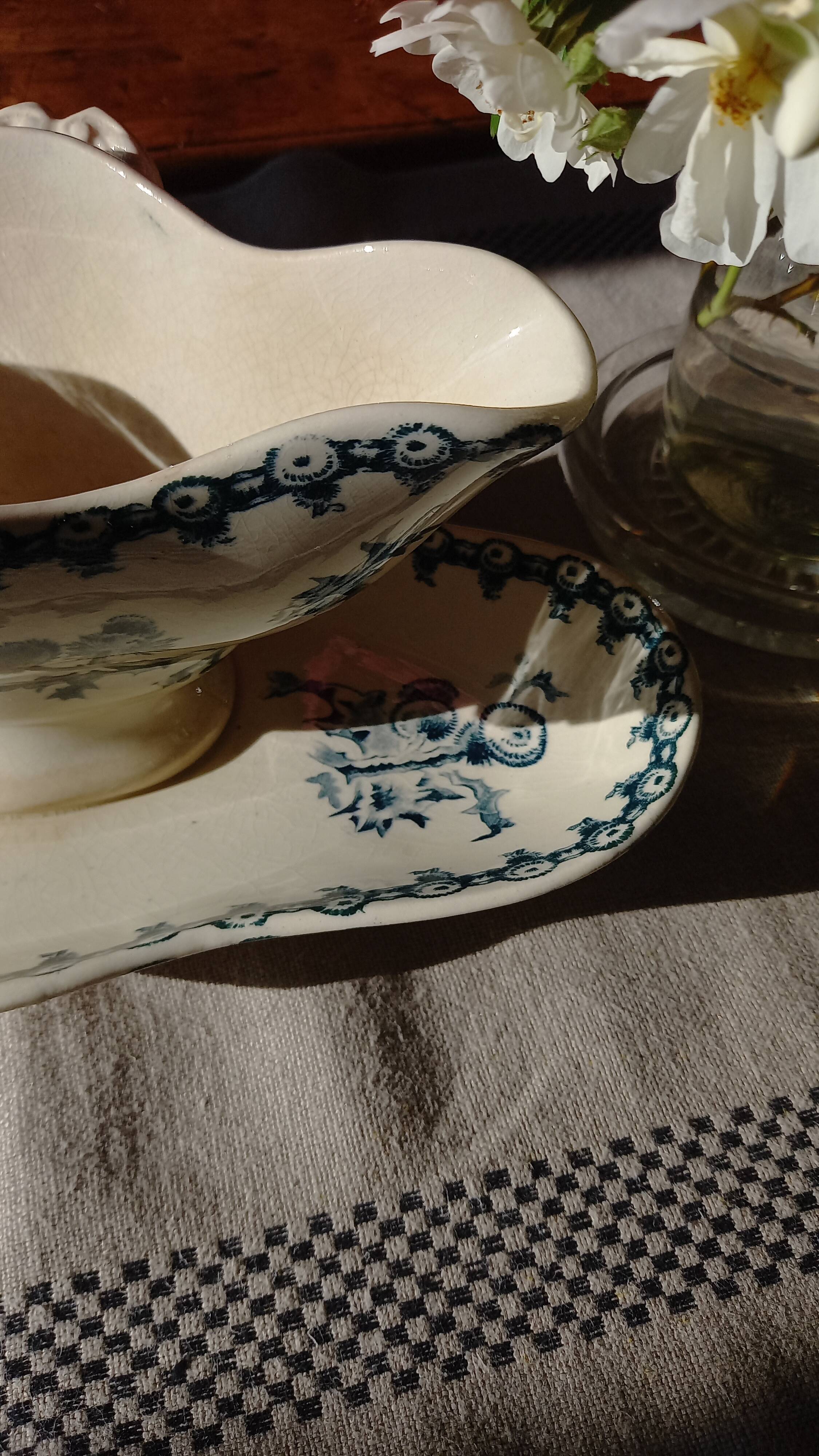 Old gravy boat on frame in terre de fer earthenware by gien, “chardons” model in blue-green
