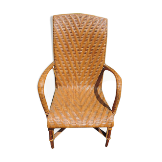 Rattan armchair with high backrest