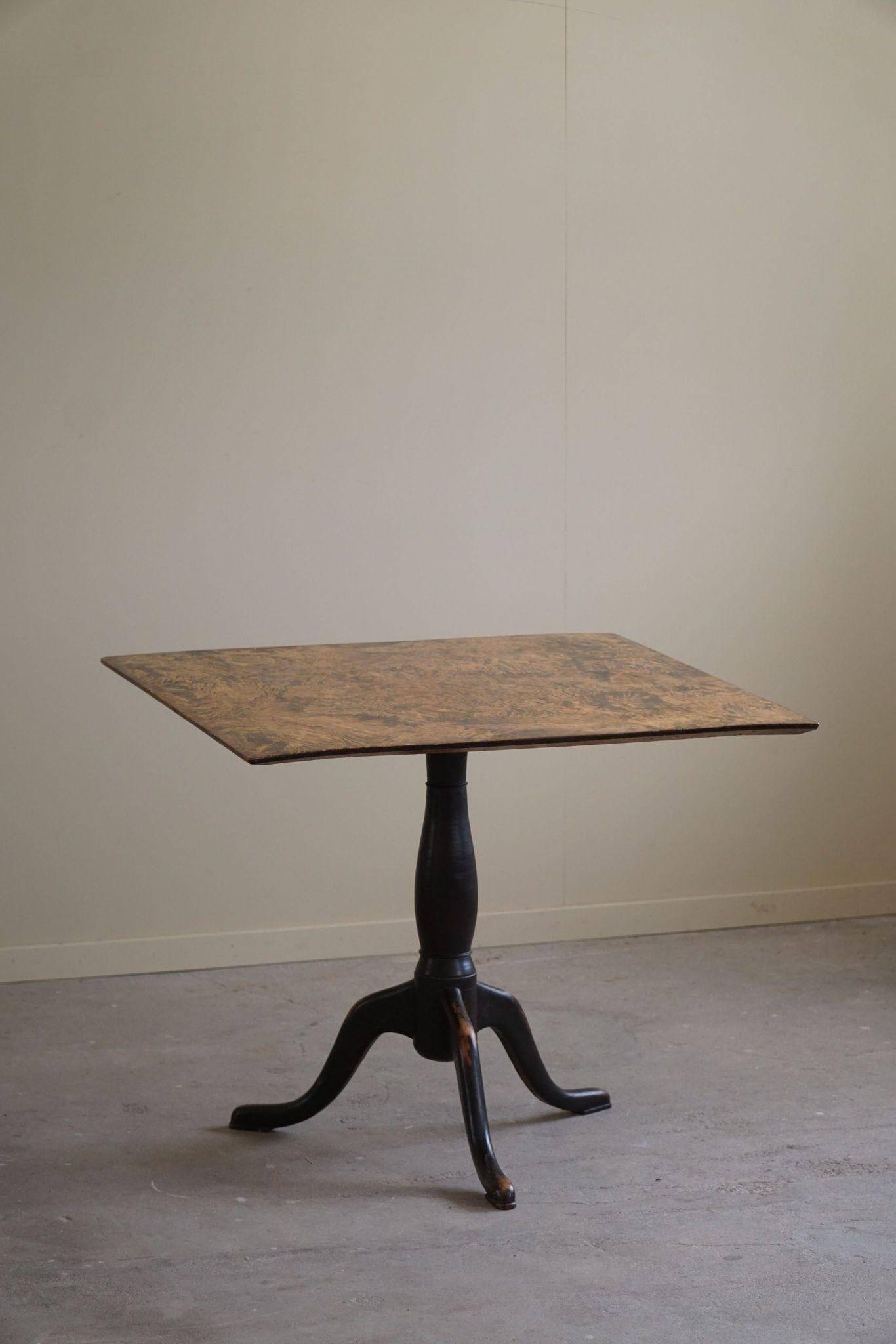 Antique square table with drop leaves made of burl wood, handcrafted in Sweden, 19th century.