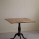 Antique square table with drop leaves made of burl wood, handcrafted in Sweden, 19th century.