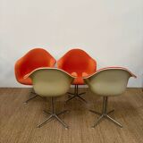 Set of 6 Eams armchairs in Hermann Miller orange fiber shell