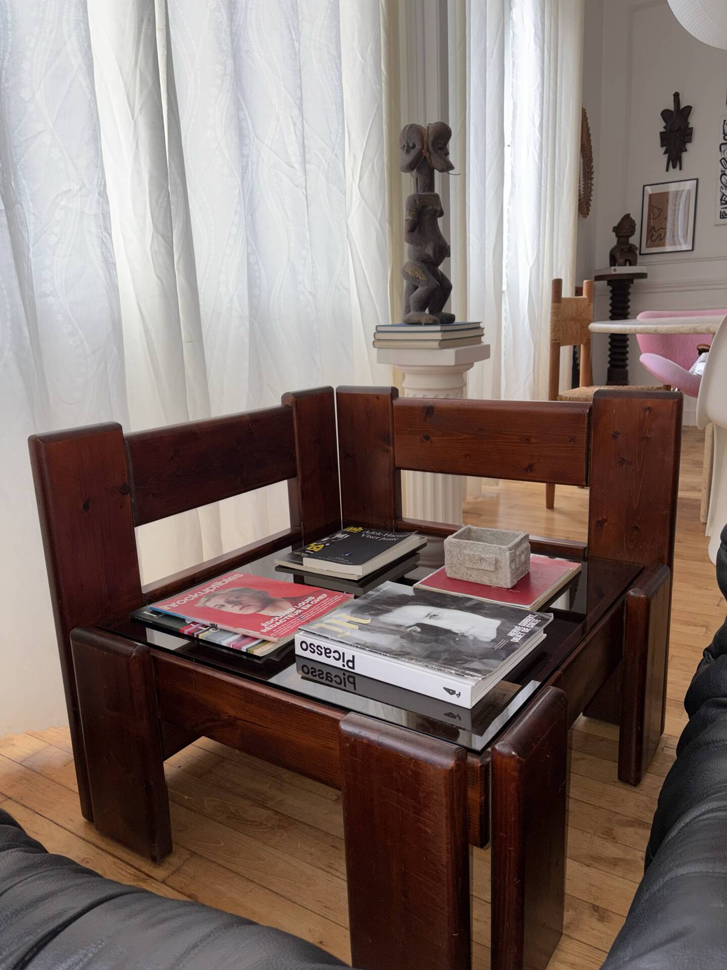 Modernist coffee table in wood and smoked glass.