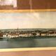 Panoramic view of Venice in a 20th century carved walnut frame