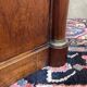 Empire bedside table from the 19th century in cherry wood and black marble.