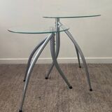 Duo of designer nesting tables with tripod base