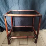 Rattan and smoked glass side table