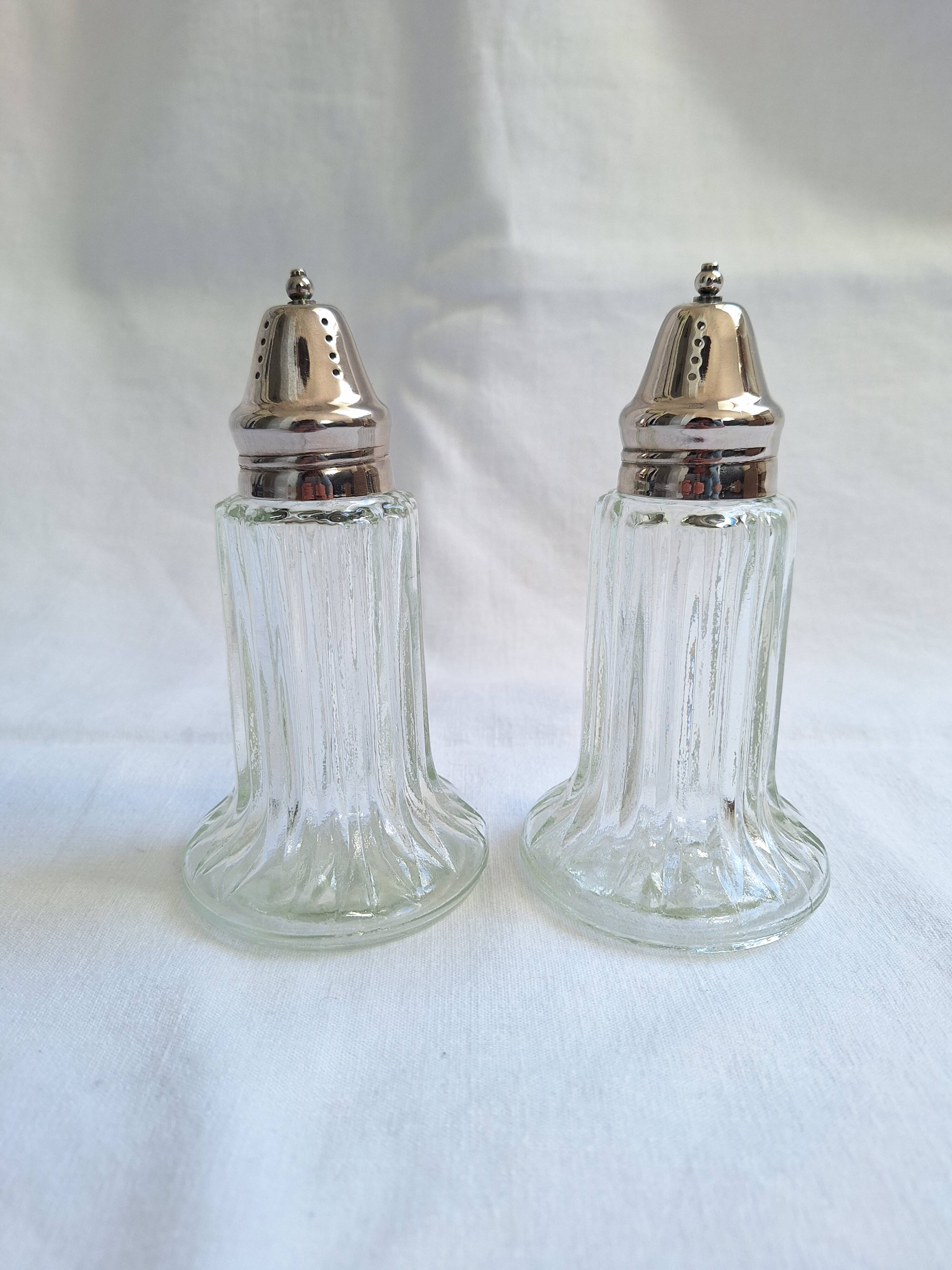 Glass and metal salt and pepper shakers