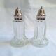 Glass and metal salt and pepper shakers