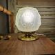 Vintage Art Deco table lamp with its artichoke globe.