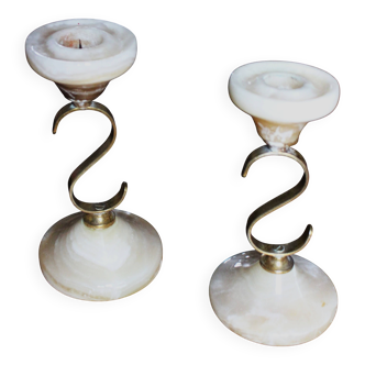 Pair of curved brass candlesticks with onyx