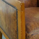 Sheep leather Art Deco design armchair combined with wood